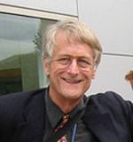 Ted Nelson smiling in a color portrait