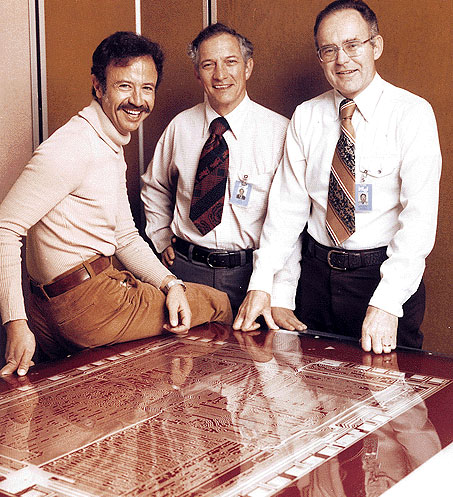 Robert Noyce (center) pictured with Gordon Moore, his Intel co-founder and an unidentified gentleman