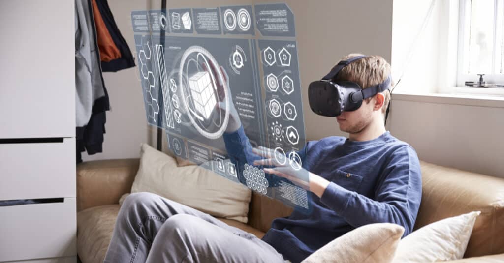 Man using virtual reality on his couch