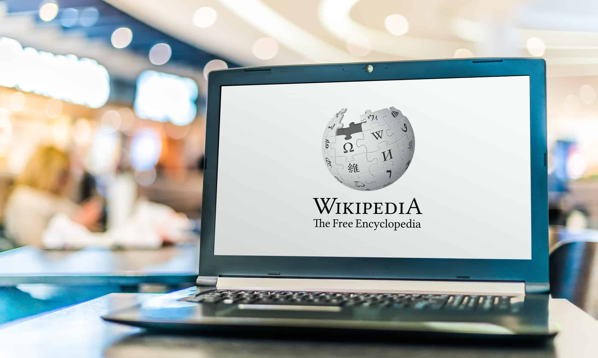 Laptop computer displaying logo of Wikipedia