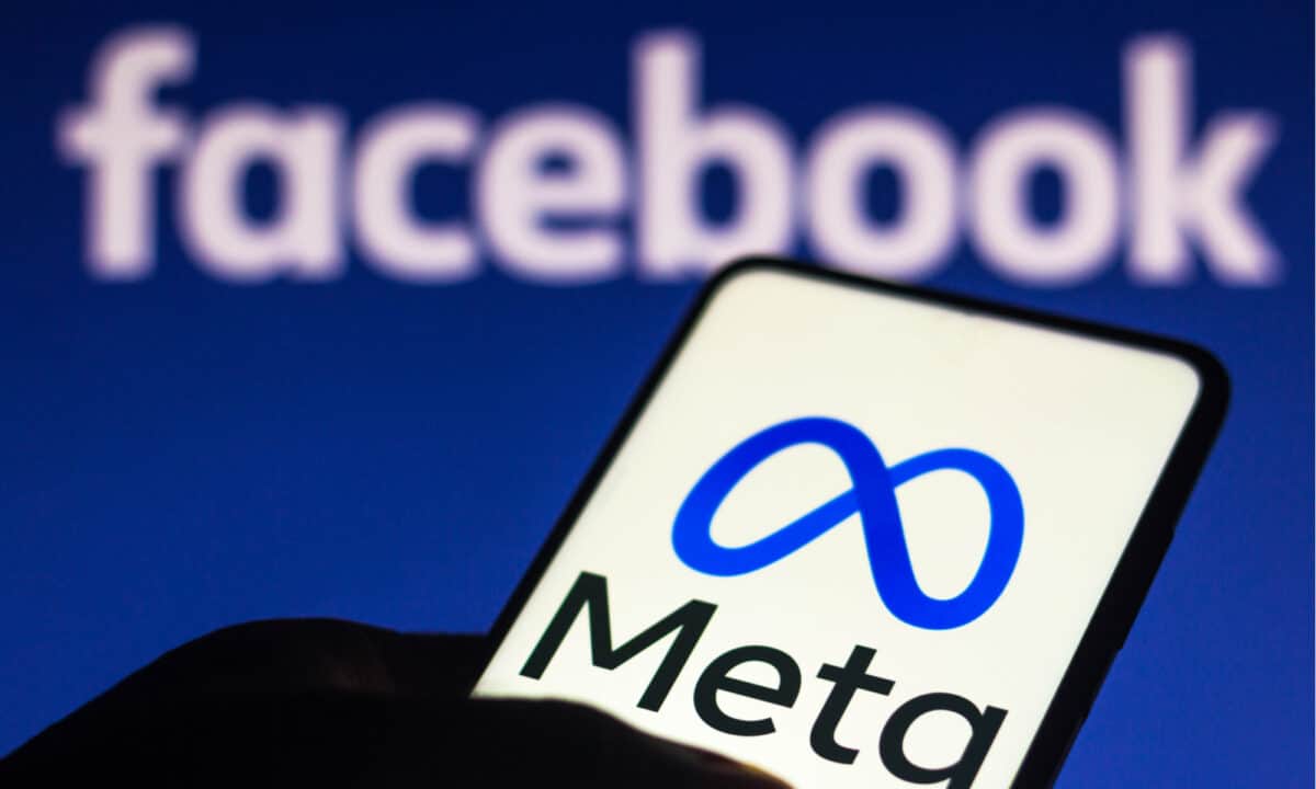 Meta and Facebook logos on screens.