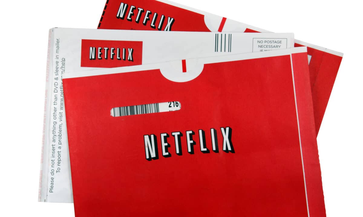 A stack of Netflix DVD sleeves.