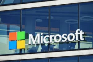 Microsoft logo on a window facade of a commercial building