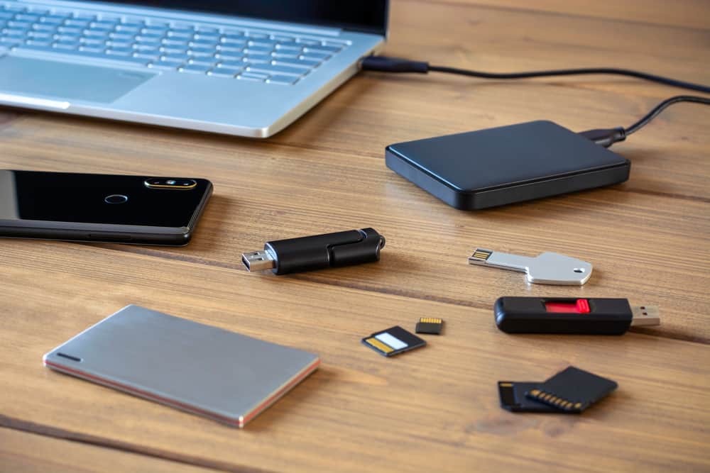 different digital storage devices on a desk