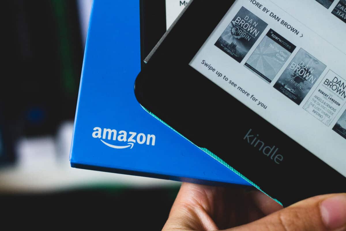 Kindle out of the box with Amazon logo showing.