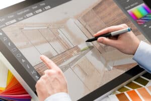 Designer using stylus on tablet graphic design drawing