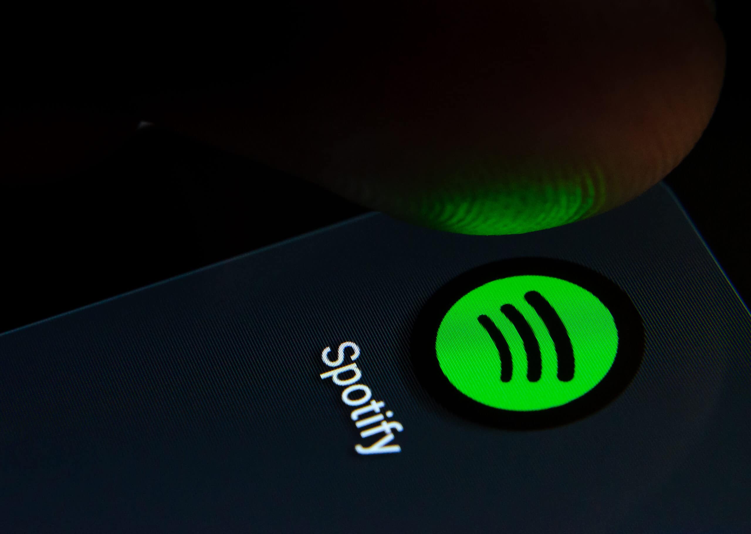 spotify icon on dark smartphone screen