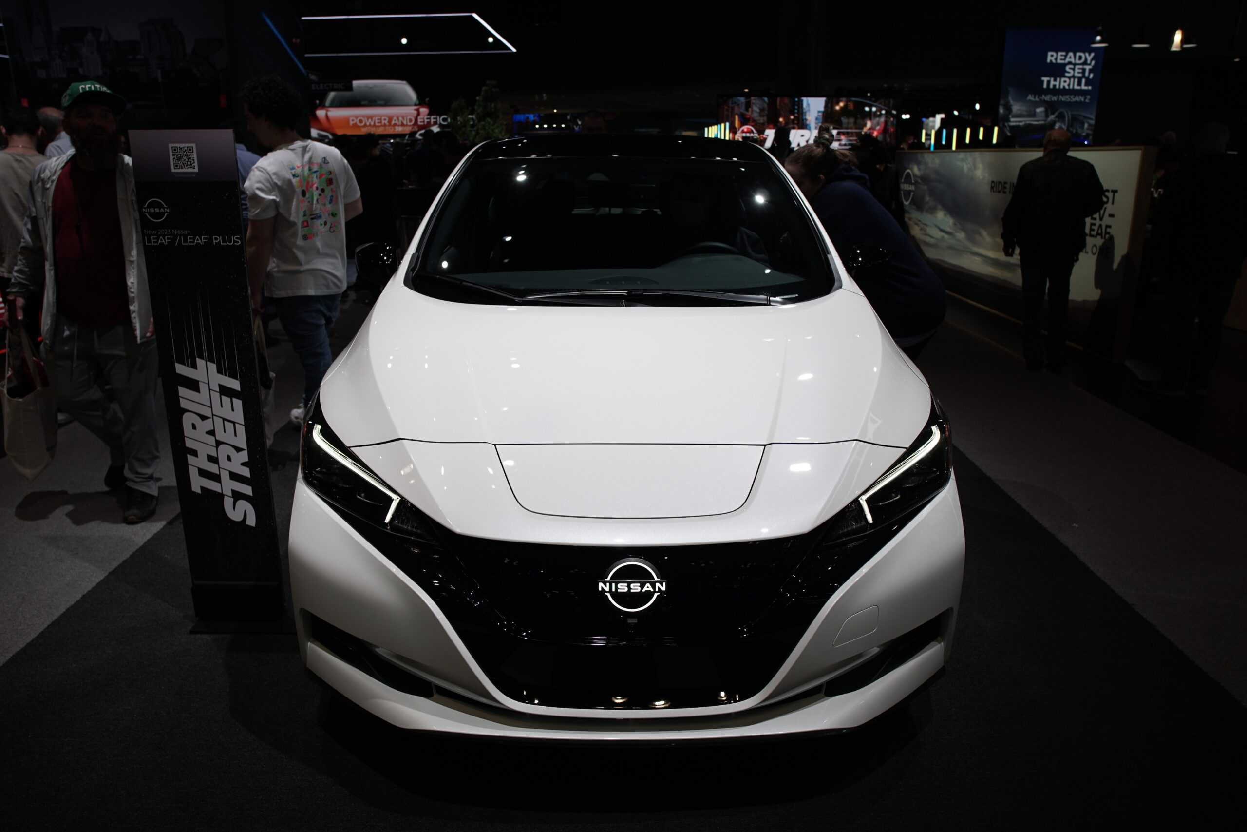 The front end of the 2023 Nissan Leaf, parked at a car show