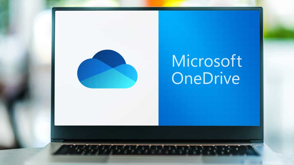 OneDrive logo on laptop screen.