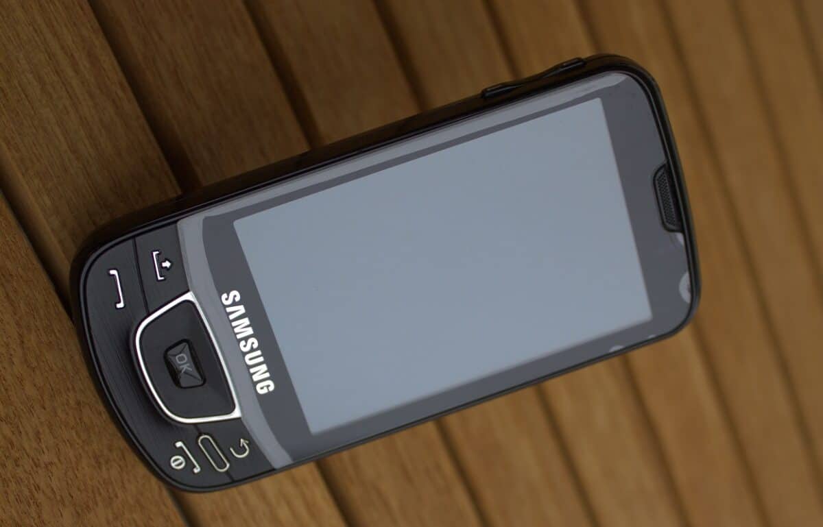 Black Samsung-I7500 on a brown table