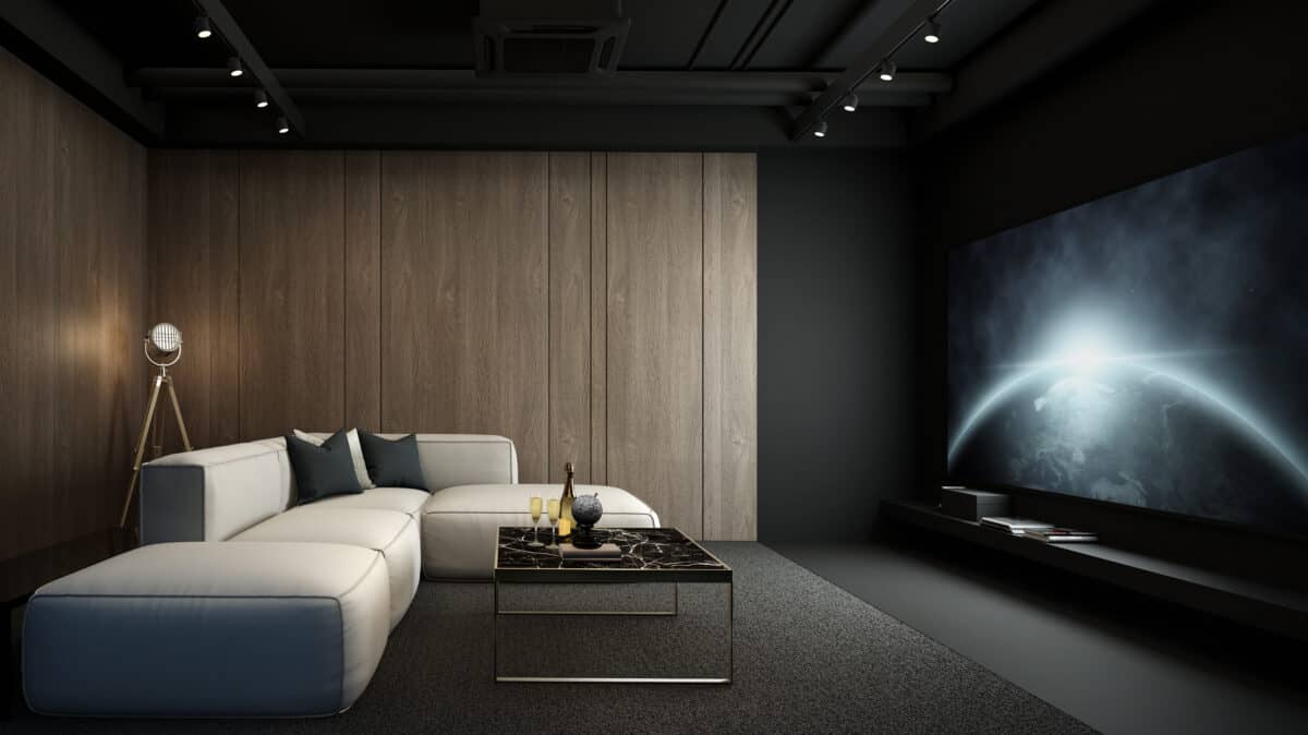 Home theater with big screen and couch.