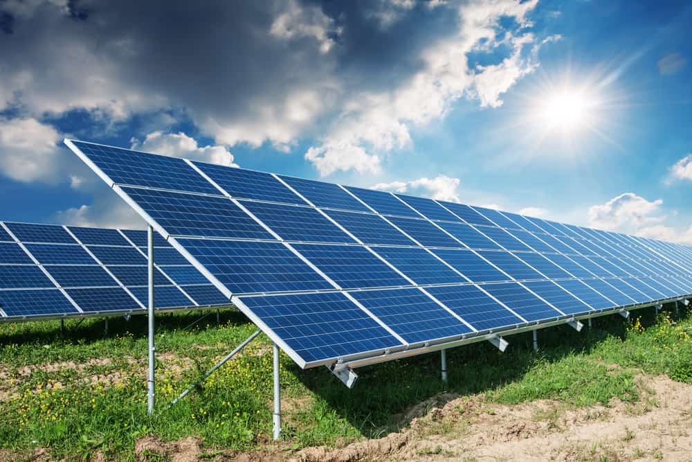 solar panels under a blue sky