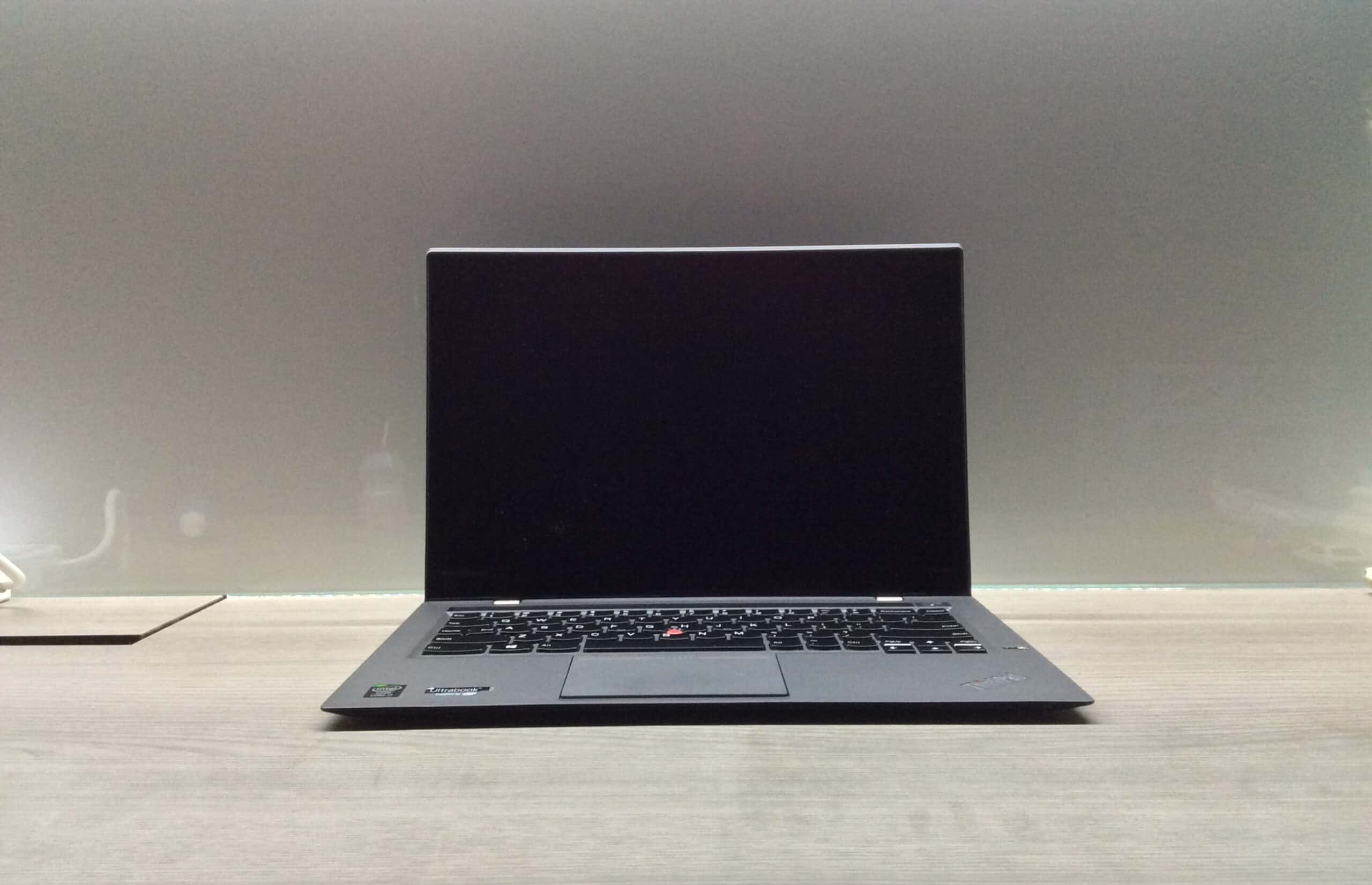 Grey Lenovo ThinkPad X1 Carbon on table top