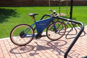 Blue sonders bike at a bike rack