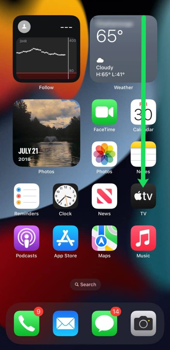 Swipe down from the top righthand corner of your iPhone's screen to open the Control Center.