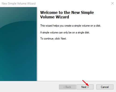 Screenshot of the New Simple Volume Wizard with the Next button highlighted.