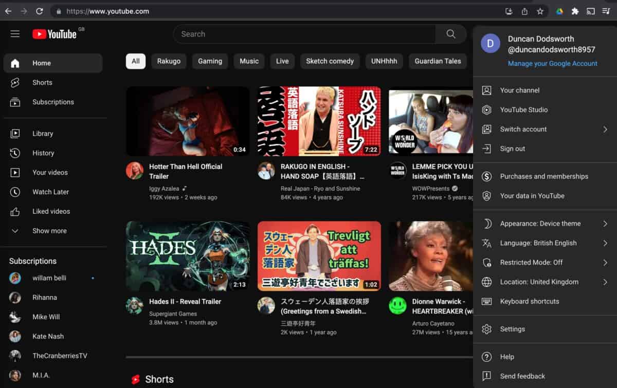 YouTube home page with the menu shown.