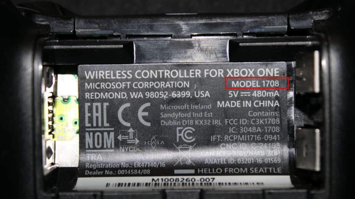 The controller model number is shown on the sticker inside the battery compartment. 