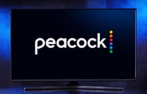 Peacock logo on flatscreen TV.
