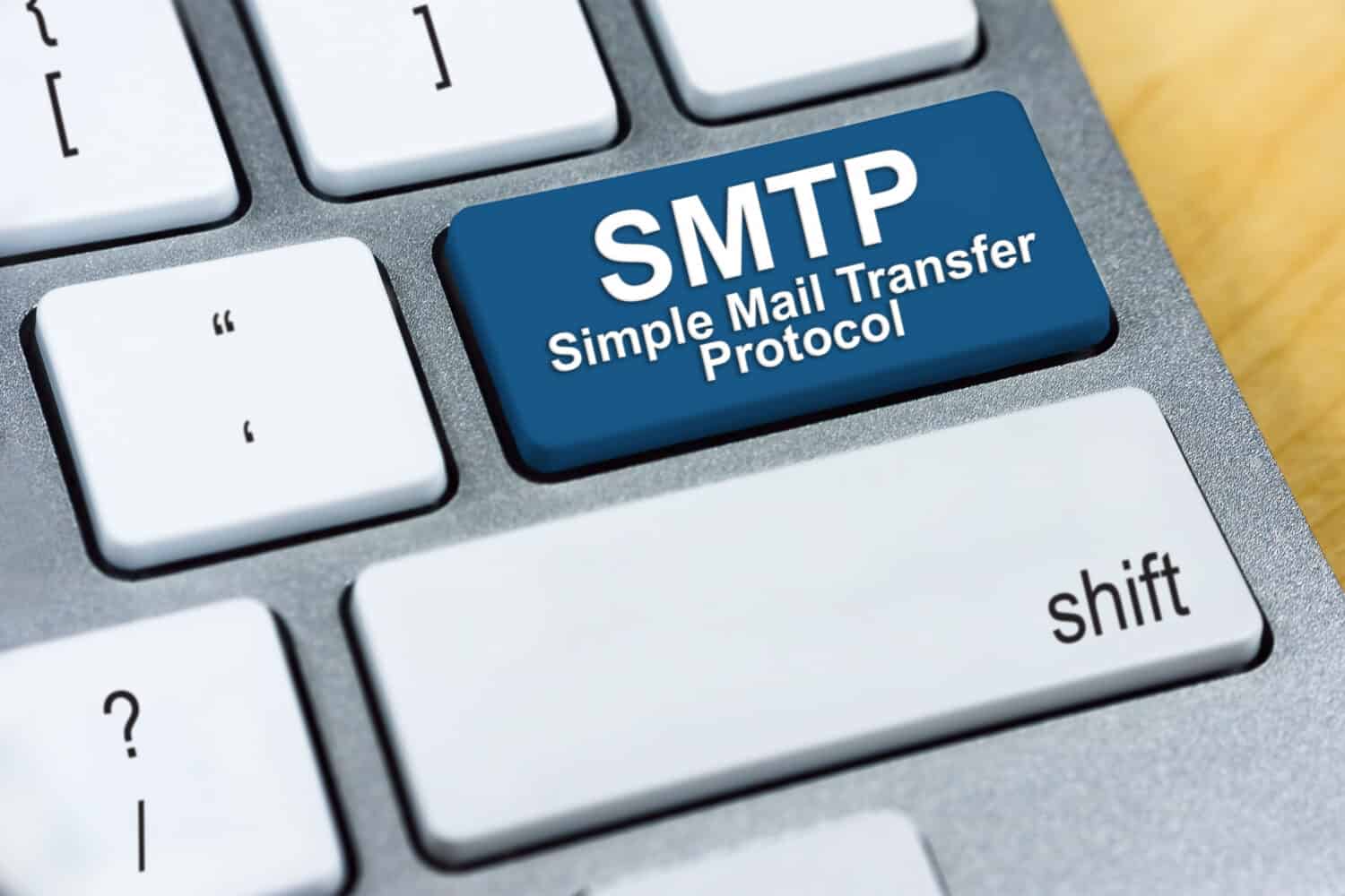 Written word SMTP Simple Mail Transfer Protocol on blue keyboard button. Internet Protocol Concept