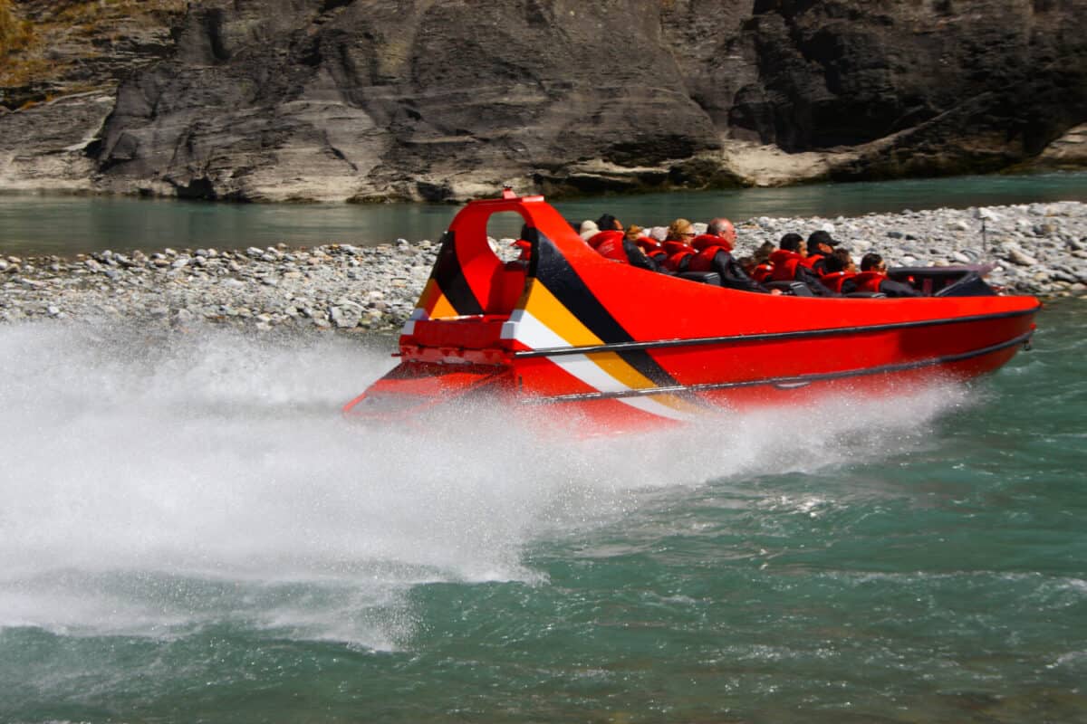 arthurs point, queenstown, jet boating at dart river in new zealand