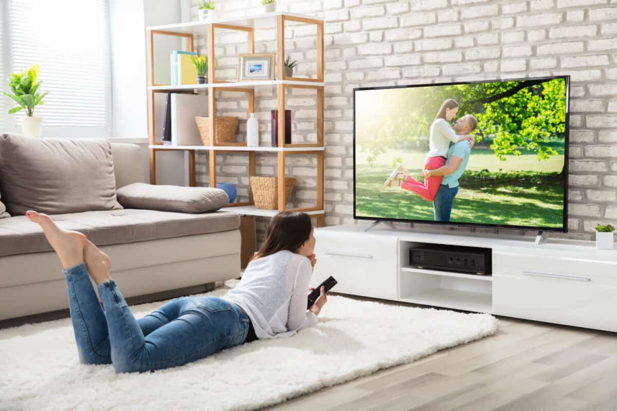 Woman watching a romance on television.