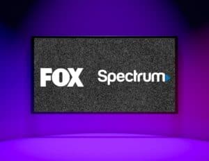 The FOX logo next to Spectrum logo on TV.