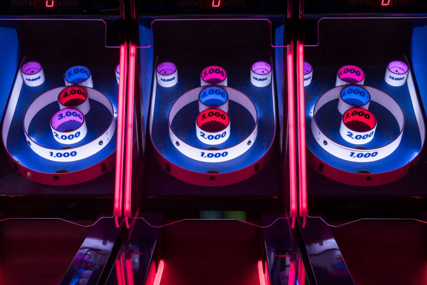 Brightly Colored Lights of Skee-ball Arcade Game