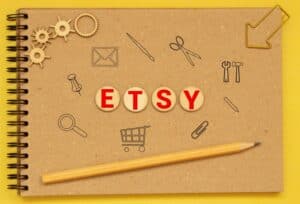 word ETSY on wooden block, busines concept, Cardboard word ETSY.
