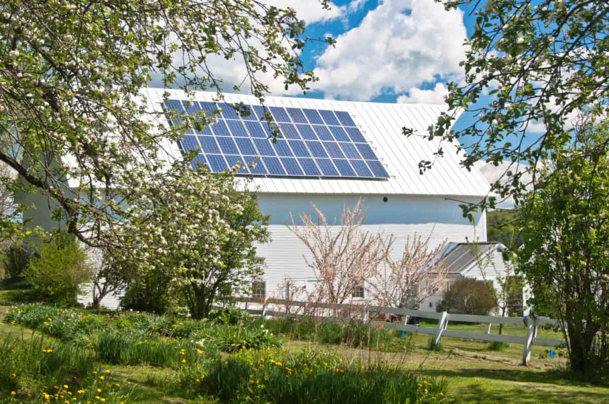 An old barn is brought up to date with solar panels on this Vermont farm.