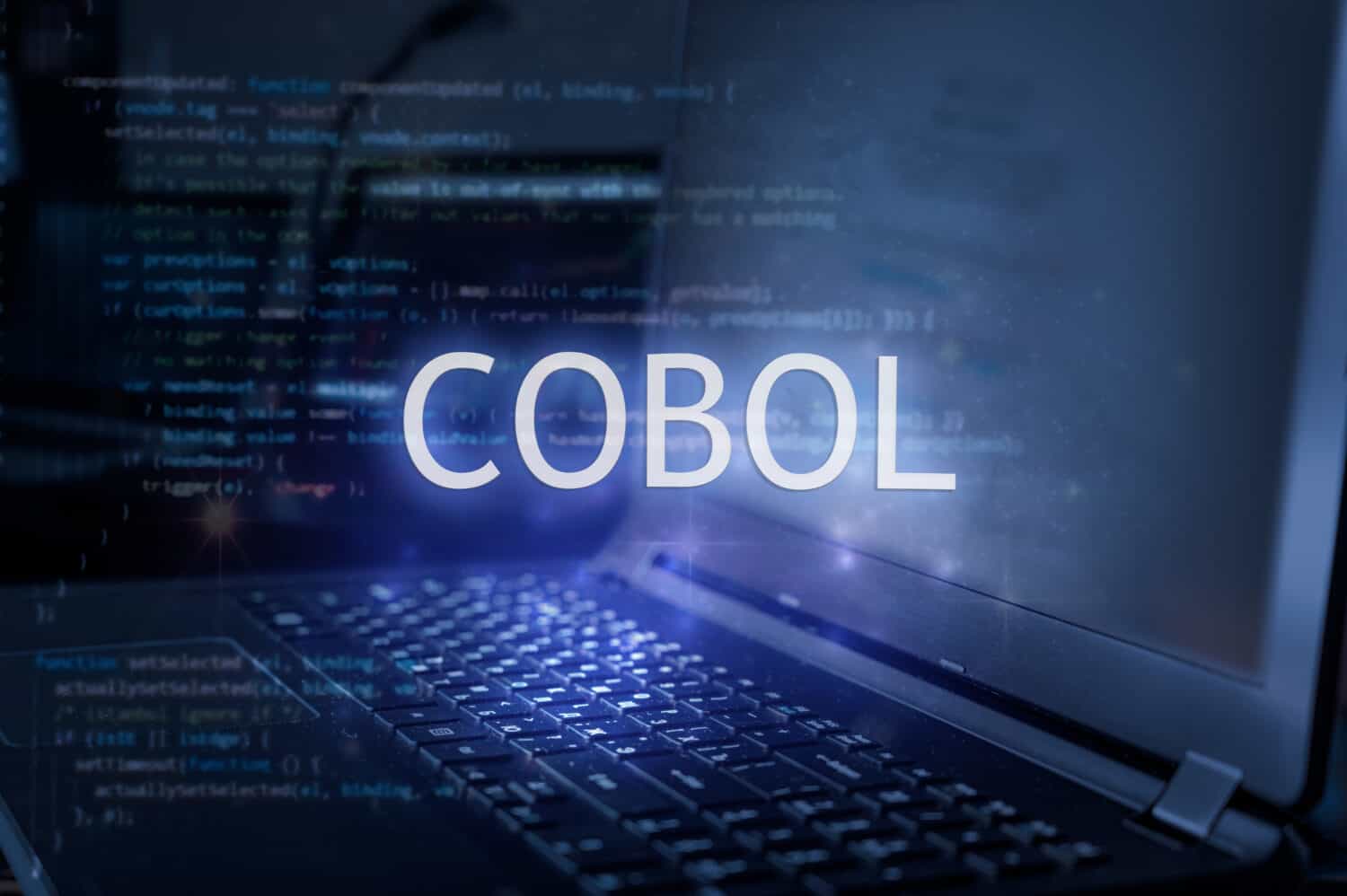 Cobol inscription against laptop and code background. Technology concept.