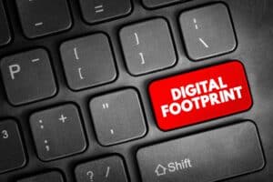 Digital Footprint is a trail of data you create while using the Internet, text button on keyboard, concept background