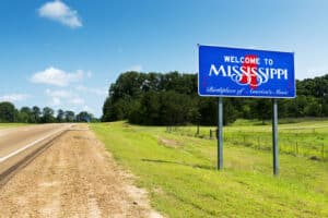 Mississippi State welcome sign along the US Highway 61 in the USA; Concept for travel in America and Road Trip in America. Part of the Misssissippi Solar article at History-Computer.