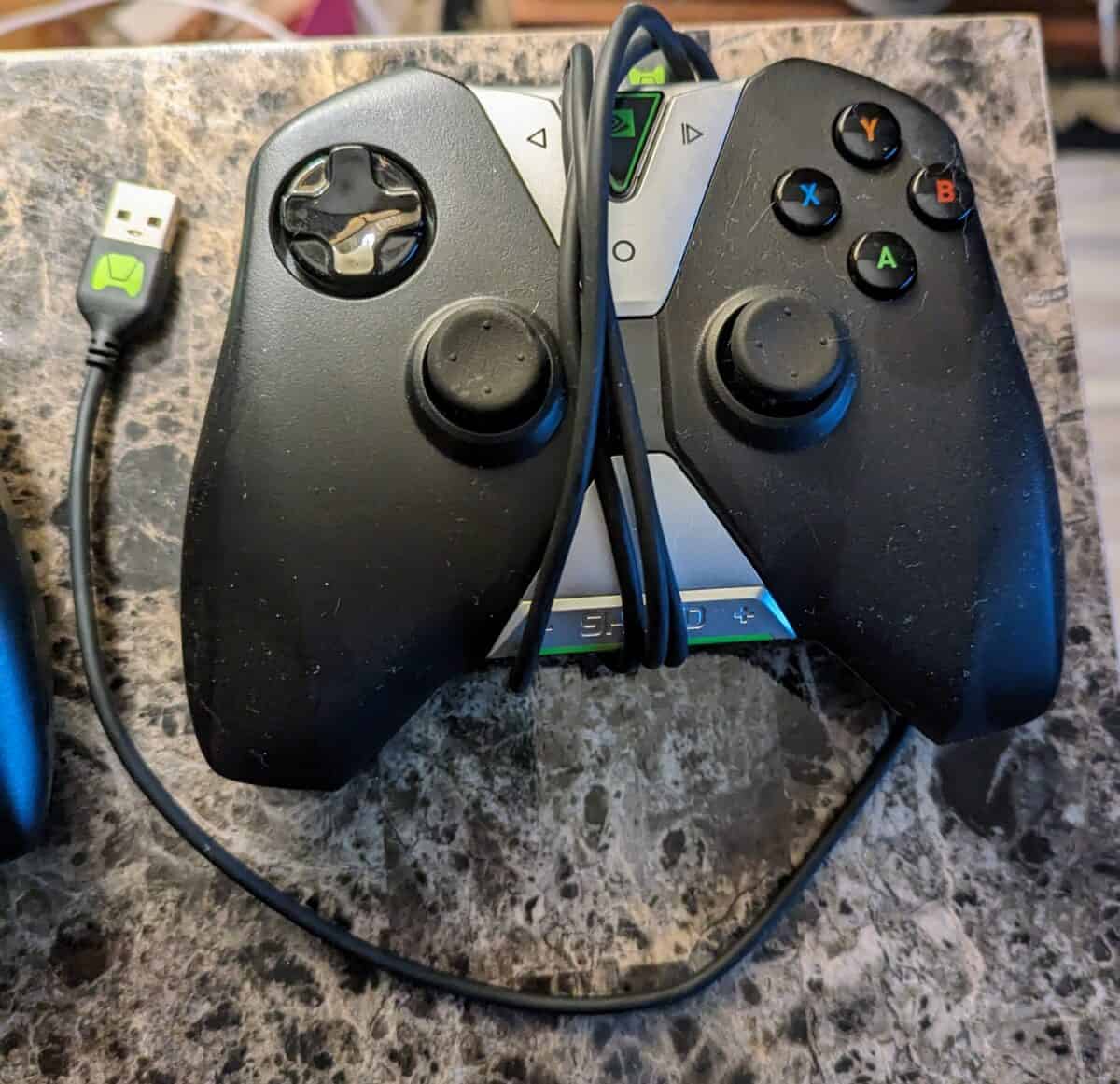 Nvidia Shield controller wrapped up in its chord.