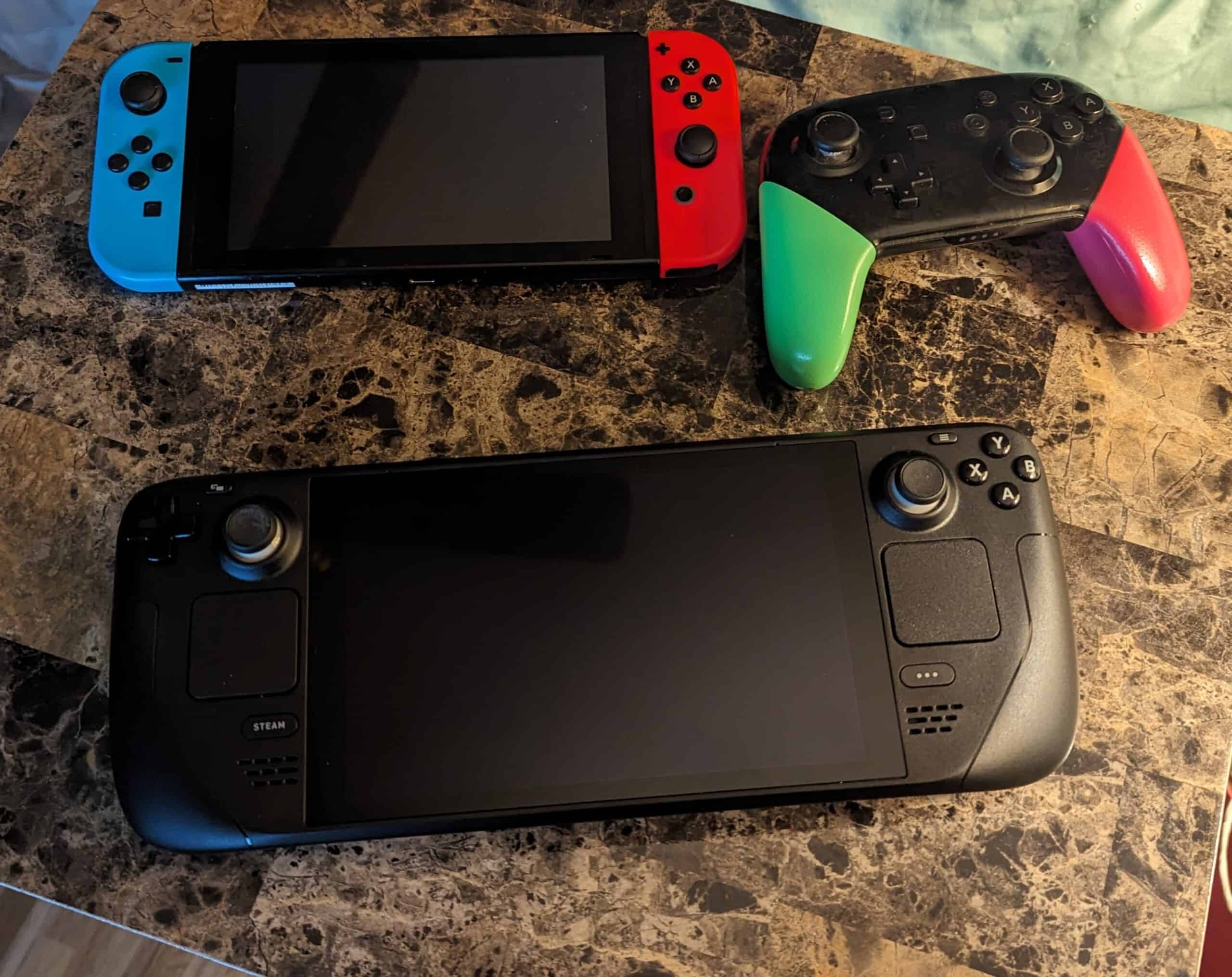 Featured image for the I prefer the Nintendo Switch article. A Nintendo Switch sitting next to a Pro controller and a Steam Deck.