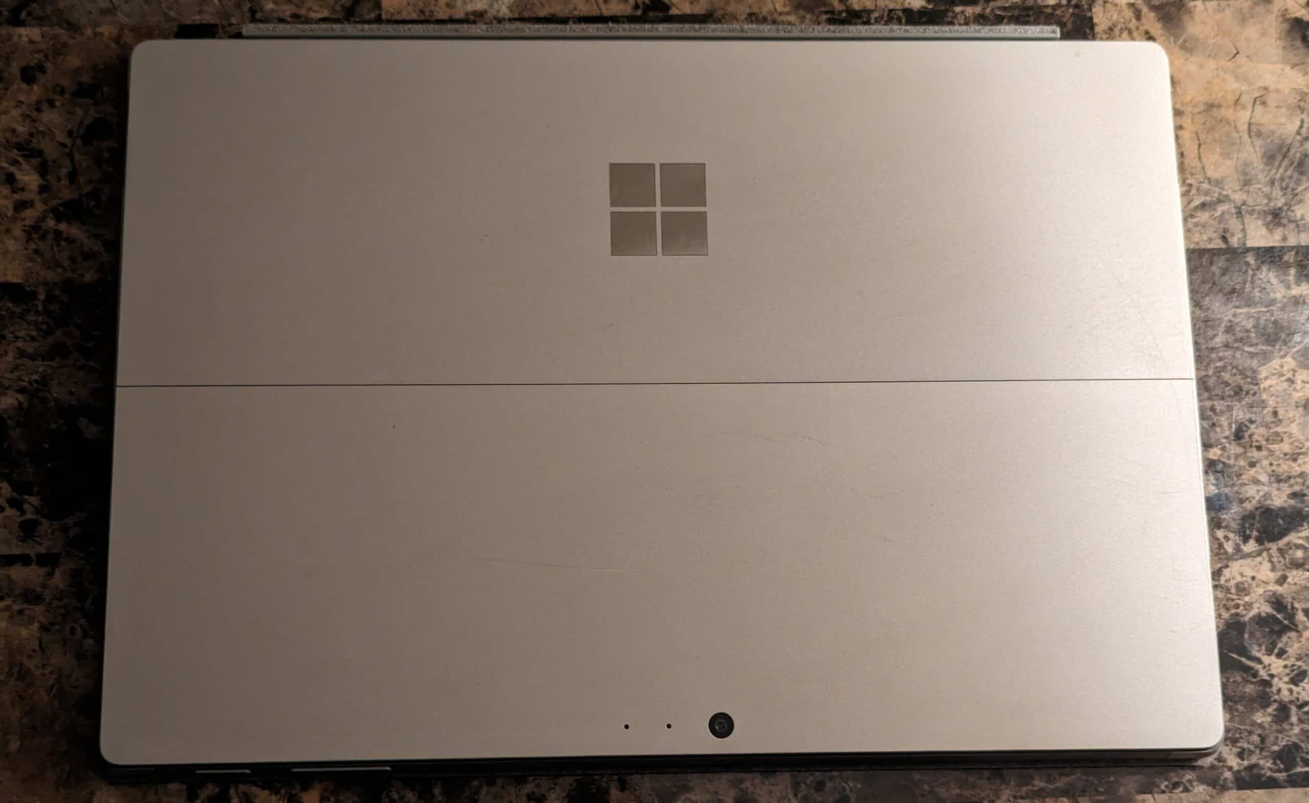 Featured Image for the Surface Pro article. Surface Pro 6 laying on a table.