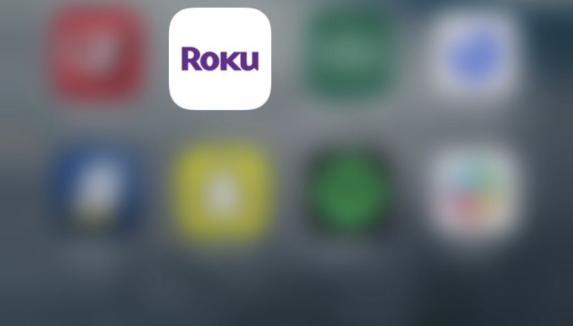 Roku app highlighted on iPhone screen.