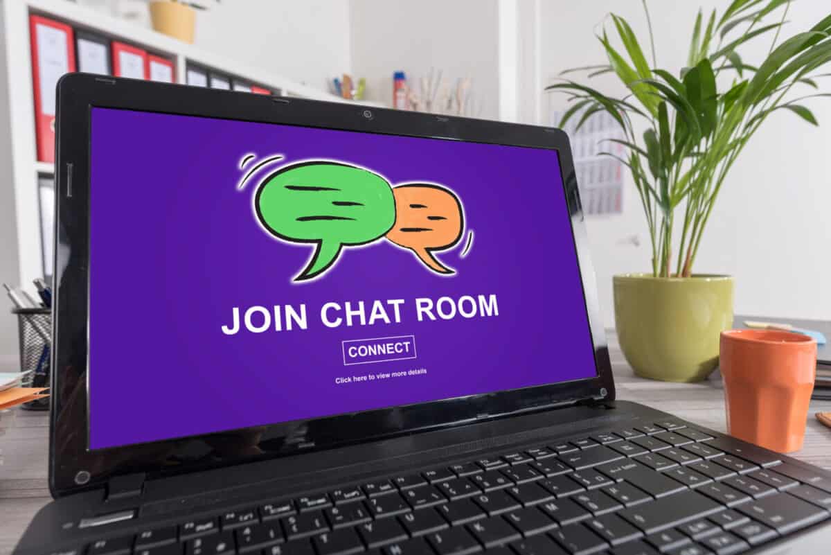 Laptop screen with chat room concept