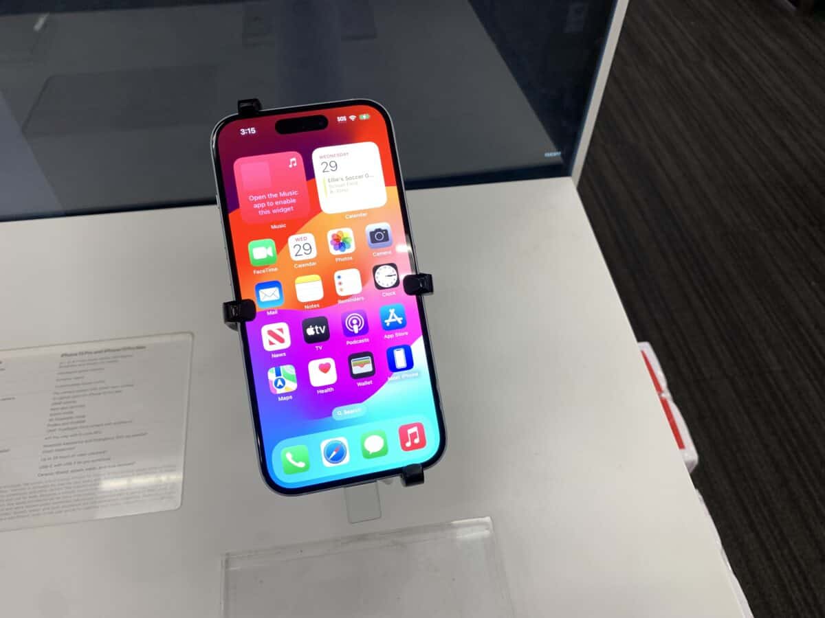An unlocked iPhone 15 on display at Target.