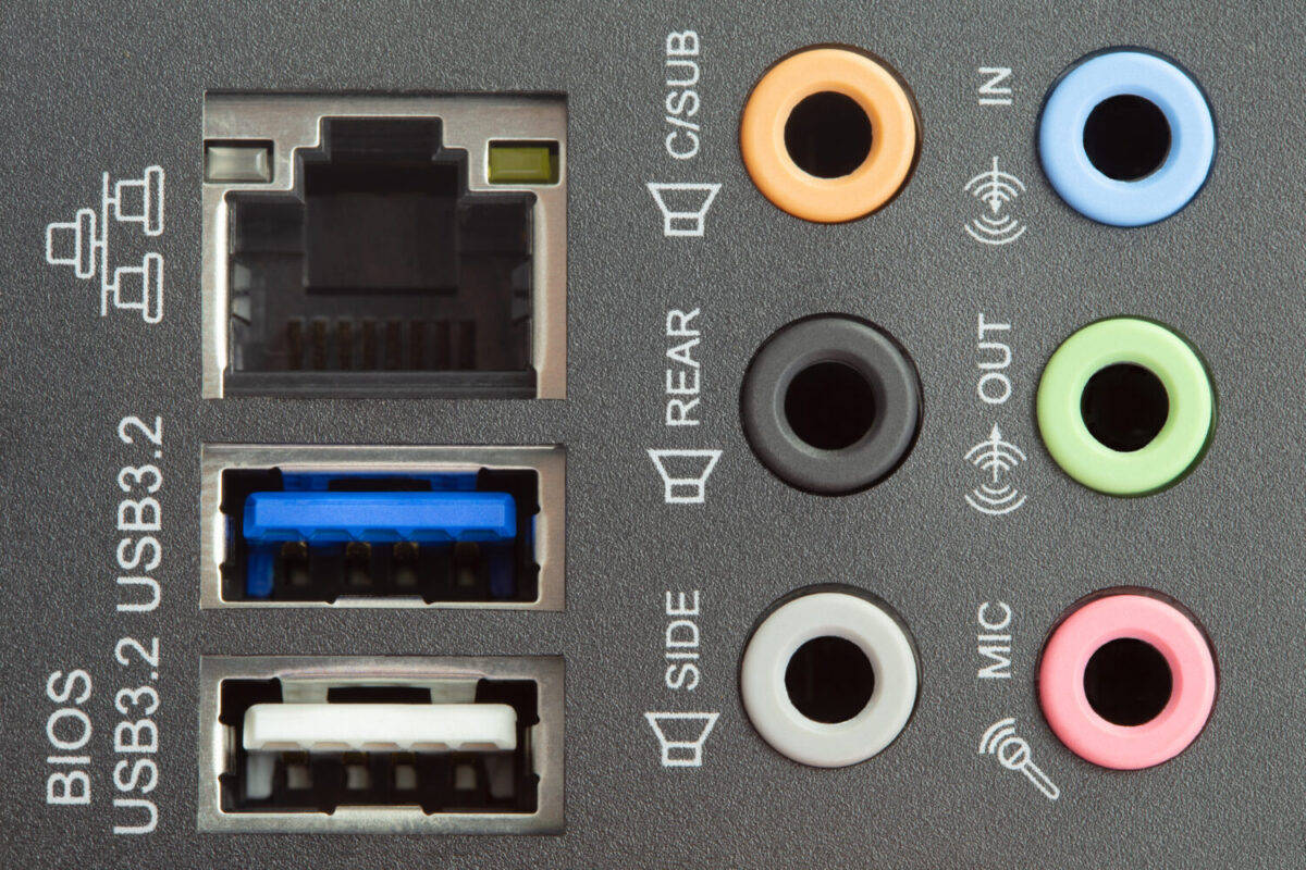 Connectors And Ports Standart Detail Ethernet or Internet RJ45 cable connector and USB 3 near Audio Sound Output and Input microphone mini jack on Motherboard panel pc computer