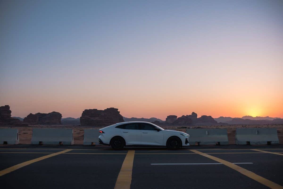 White sports car at dusk