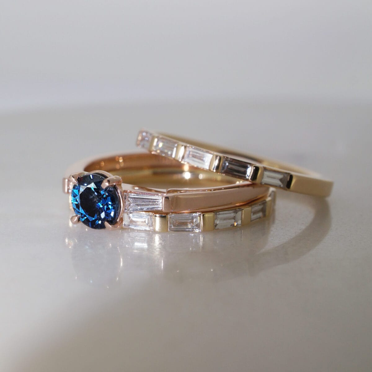 A wedding ring set with a sapphire.