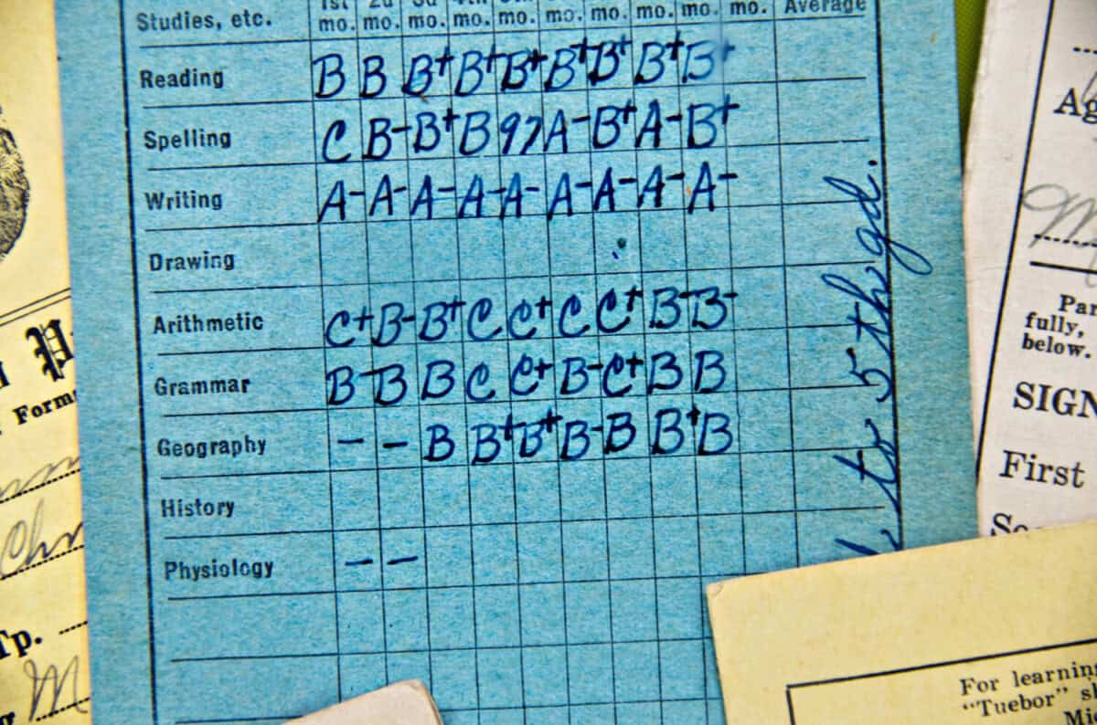 close up of old school report card