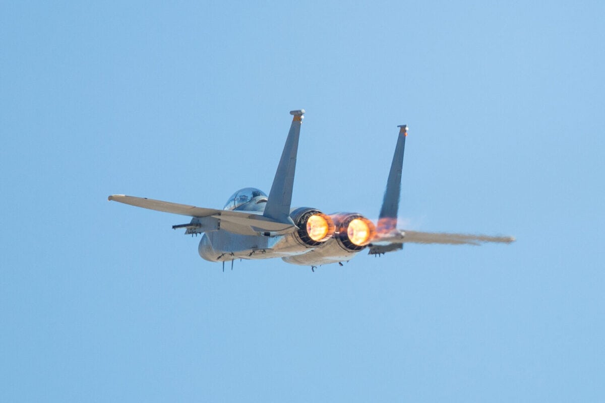 F-15 Eagle in a very close back view, with afterburners on