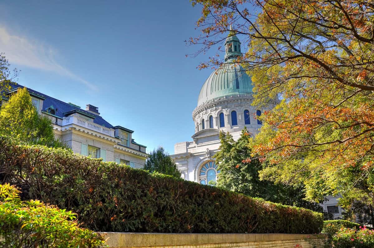 The large green dome of the United States Naval Academy chapel adorns the autumn skyline in Annapolis, Maryland. It is a National Historic Landmark.
