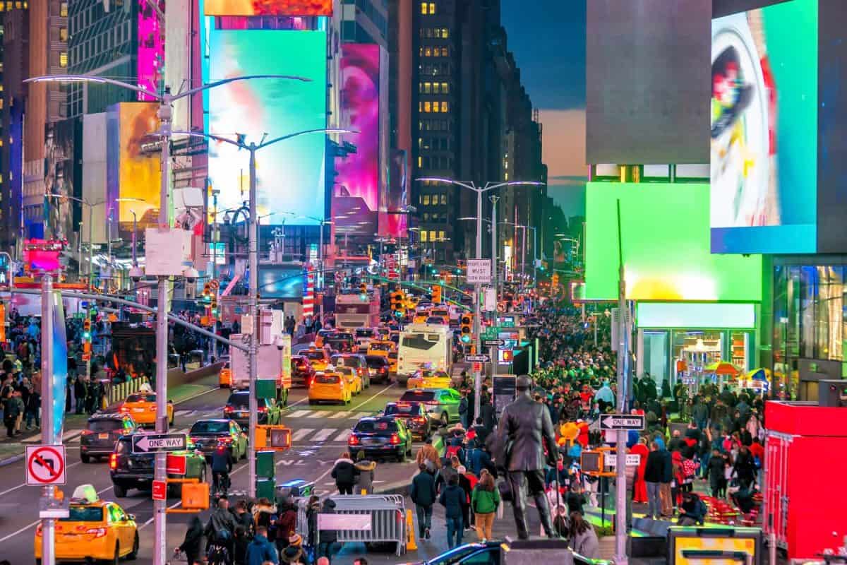 Times Square with neon art and commerce, an iconic street of Manhattan in New York City , United States