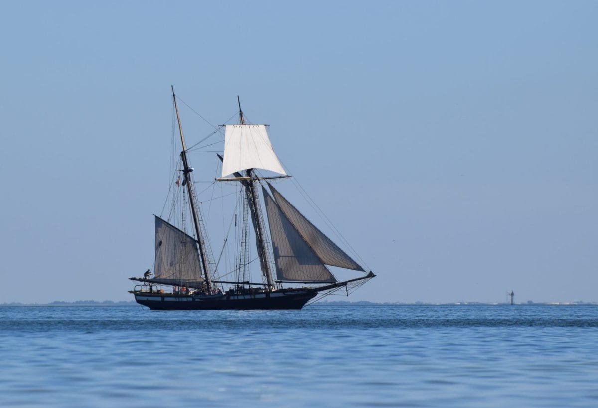 Historic 19th century sailing ship at sea.