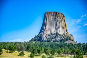 Geological formation called Devil's Tower against an empty sky