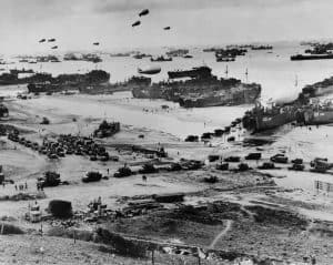Omaha Beach after D-Day. Protected by barrage balloons, ships delivered trucks loaded with supplies. June 7-10, 1944, World War 2. Normandy, France, World War 2.