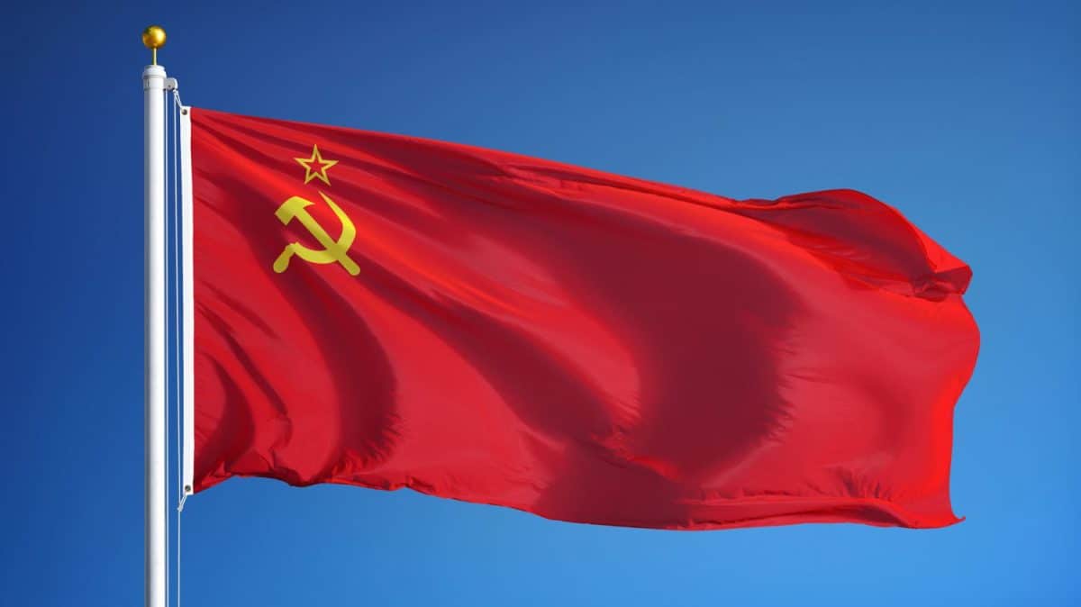 The Union of Soviet Socialist Republics flag waving against sky, close up, isolated with clipping path mask alpha channel transparency